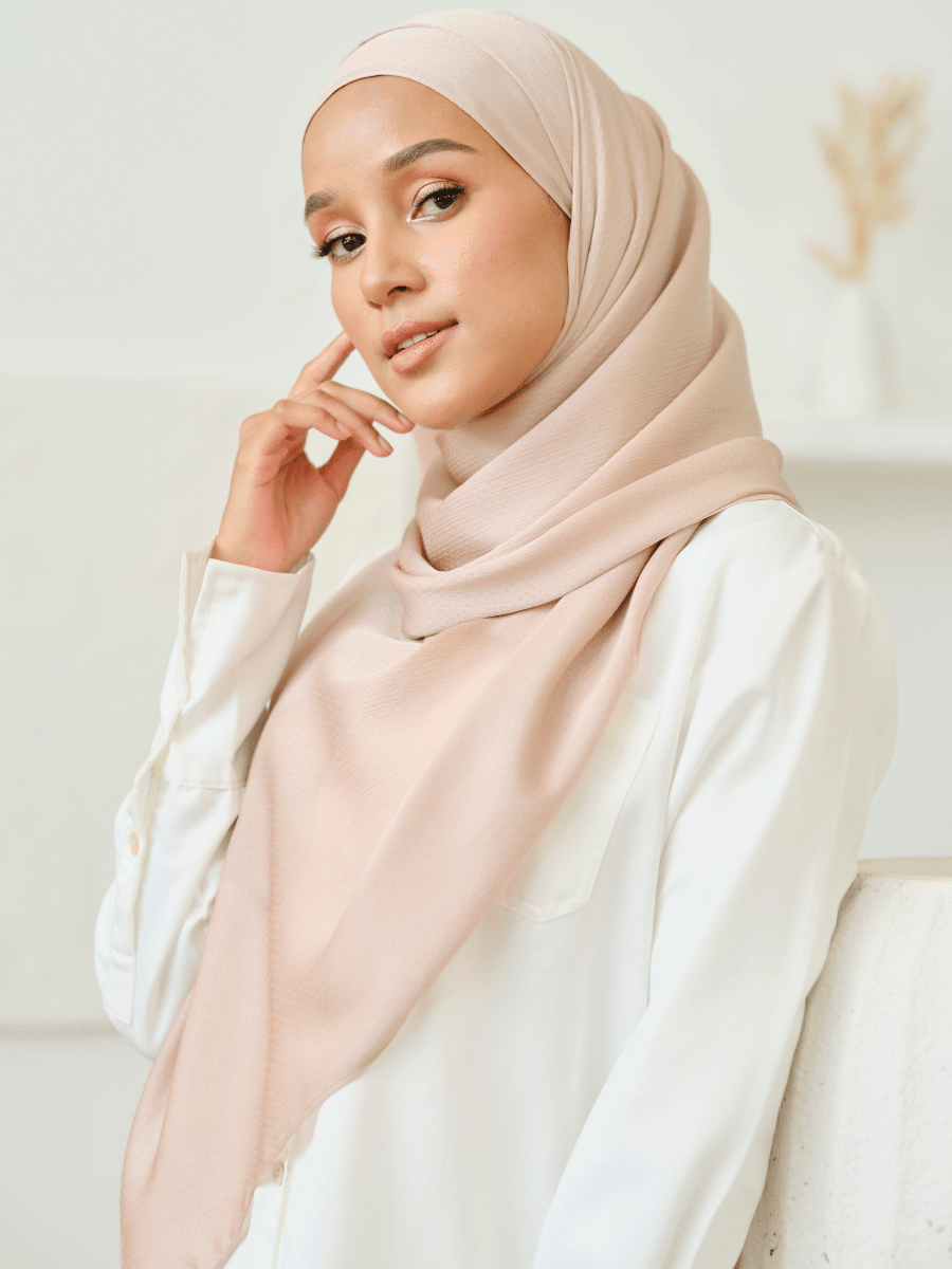 TC Arya in Tan